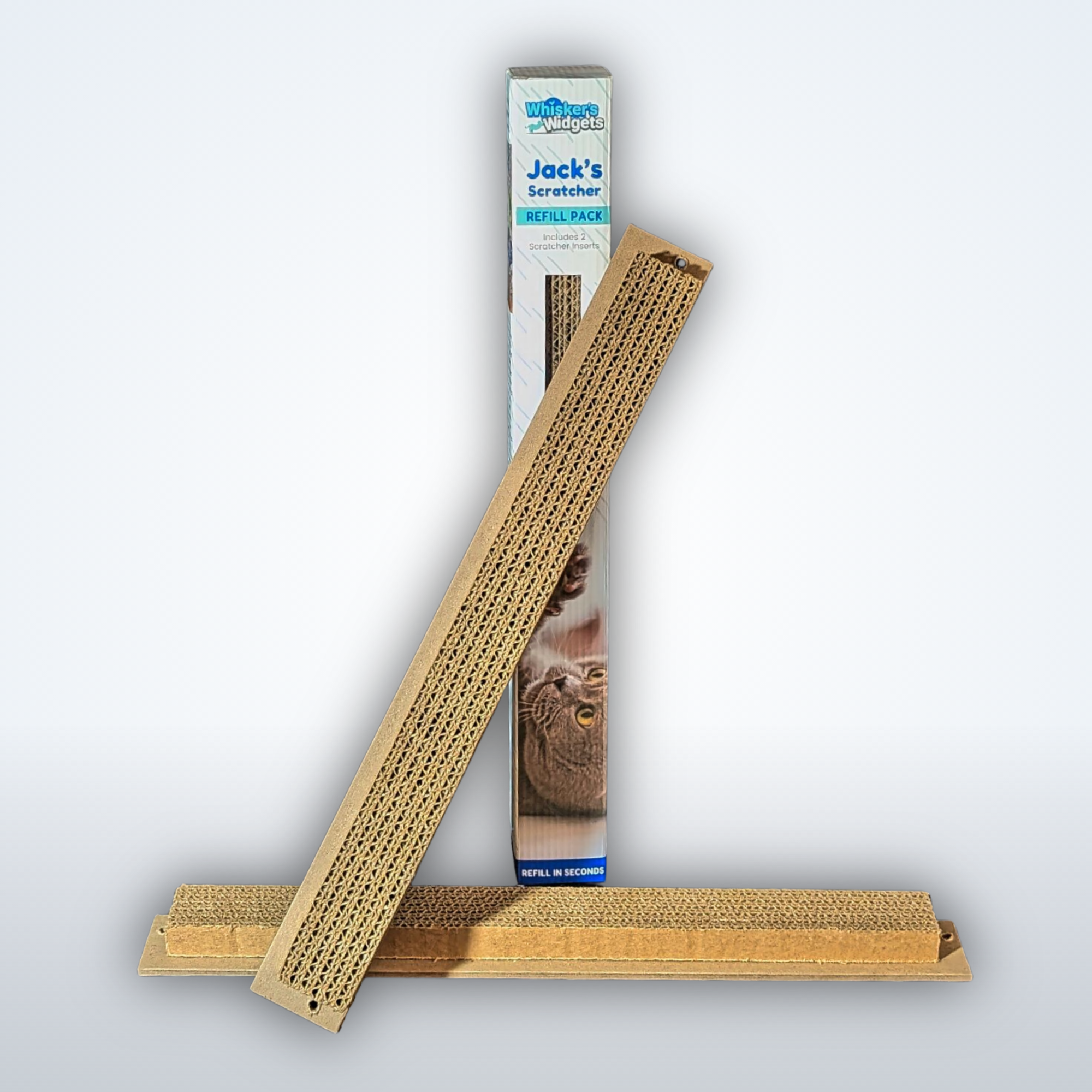 Two Jack's Scratcher cardboard inserts with packaging on a light gray background.